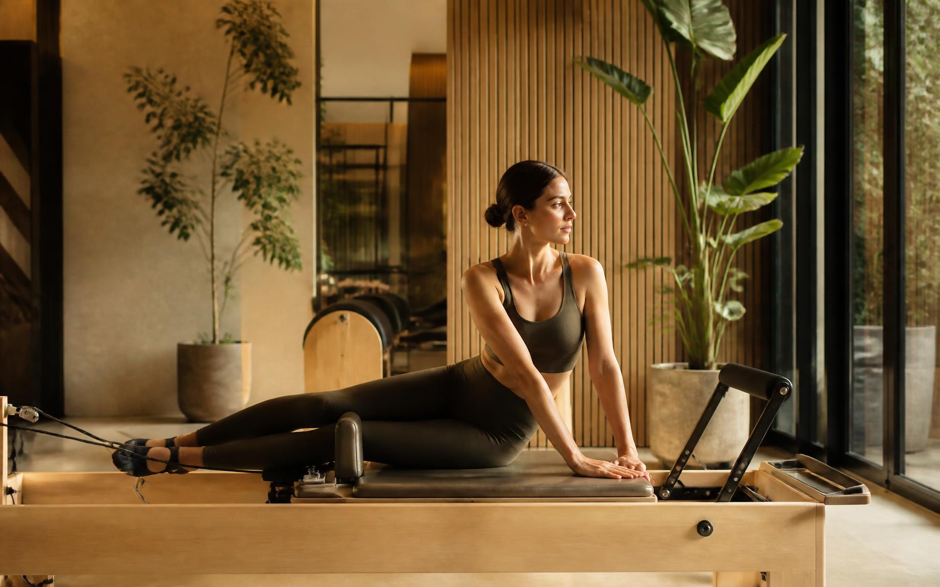 El espacio EQÜA con Pilates Reformer de madera